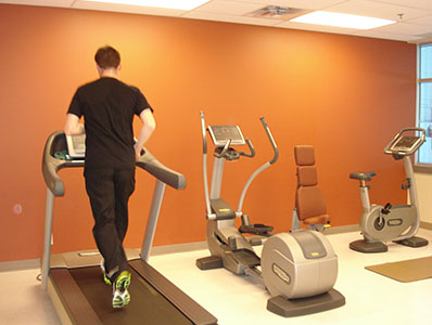 Employee on Treadmill at the Gym in the Patlon Halton Hills headquarter